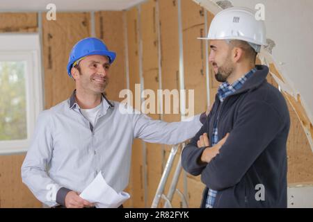 Porträt von zwei Bauern, die sich unterhalten Stockfoto