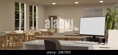 Ein Computermodell mit weißem Bildschirm auf einem Schreibtisch in einem modernen minimalistischen Klassenzimmer. Lehrerpult in einem Klassenzimmer. 3D-Rendering, 3D-Abbildung Stockfoto