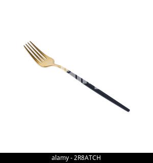 Schwarze und goldene Metallgabel isoliert auf weißem Hintergrund. Stockfoto