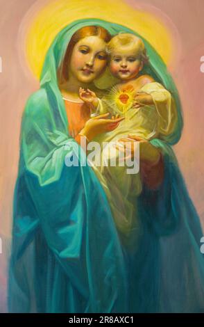 GENUA, ITALIEN - 6. MÄRZ 2023: Das Gemälde von Madonna (unbefleckt) in der Kirche Chiesa di Santa Caterina von Mattia Traverso (1941). Stockfoto