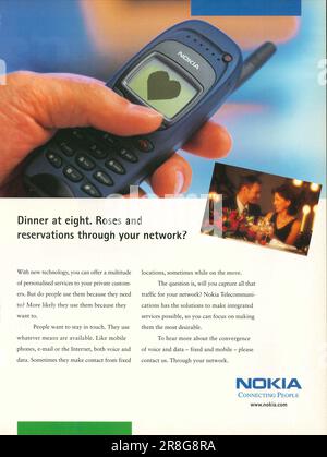 NOKIA Connecting People Werbespot in einem Magazin 1999 Stockfoto