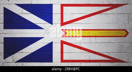 Die Flagge von Neufundland und Labrador ist auf eine Betonblockwand gemalt. Stockfoto