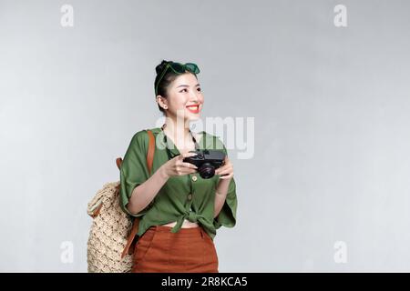 Asiatische Reisende mit Kamera. Stockfoto