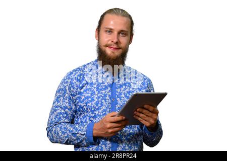 Glücklicher Geschäftsmann mit Tablet auf weißem Studiohintergrund Stockfoto