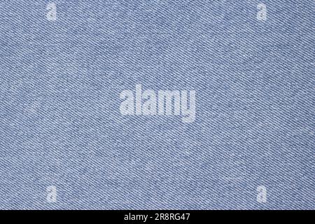 Textilstruktur aus blauer Jeans als Hintergrund, Denim-Textilstruktur Nahaufnahme. Stockfoto
