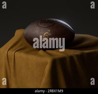 Eine 3D-Darstellung eines Rugby-Balls aus altem Leder mit goldenem Rugby-Logo in australien auf einem goldenen Stoff - 13. Februar 2023 in Bristol, Uni Stockfoto