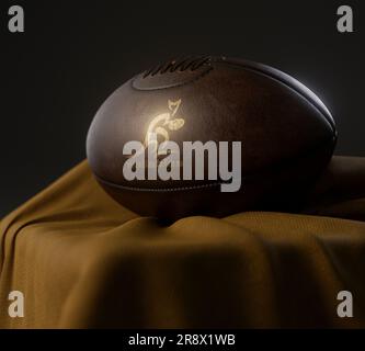 Eine 3D-Darstellung eines Rugby-Balls aus altem Leder mit goldenem Rugby-Logo in australien auf einem goldenen Stoff - 13. Februar 2023 in Bristol, Uni Stockfoto