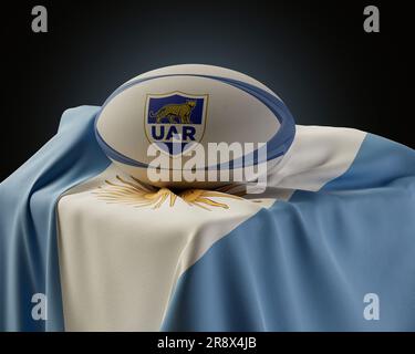 Eine 3D-Darstellung eines generischen Rugby-Balls mit dem Pumas Rugby-Logo auf einer drapierten argentinischen Nationalflagge – 4. Dezember 2022 in Bristol, Uni Stockfoto