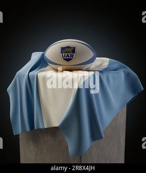 Eine 3D-Darstellung eines generischen Rugby-Balls mit dem Pumas Rugby-Logo auf einer drapierten argentinischen Nationalflagge – 4. Dezember 2022 in Bristol, Uni Stockfoto