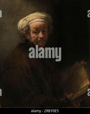 Selbstporträt als Apostel Paul, 1661. Hier ist Rembrandt ungefähr 55. In diesem Porträt repräsentiert er den Heiligen Paulus, den Apostel, identifiziert durch seine üblichen Eigenschaften: Ein Manuskript und ein Schwert, dessen Griff sich unter dem Umhang erstreckt. Das Selbstporträt ist typisch für Rembrandt's späten Malstil: Er verwendete die Farbstruktur in der Komposition, wie zum Beispiel in den Falten des Turbans. Stockfoto