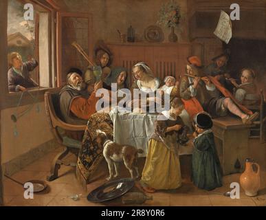 Die Fröhliche Familie, 1668. Jung und Alt haben eine wunderbare Zeit: Mutter und Großmutter singen, die Kinder spielen Musik und rauchen, und Vater hebt sein Glas. Der Zettel auf dem Kaminsims sagt ganz deutlich: "Wie der alte Song, so pfeif die Jüngeren". Steens Bild erweckt das Sprichwort zum Leben und warnt den Zuschauer: Wenn die Eltern ein schlechtes Beispiel geben, dann werden die Kinder dem Beispiel folgen. Stockfoto