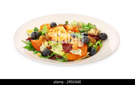 Köstlicher Persimonsalat mit Blaubeeren und Rucola isoliert auf Weiß Stockfoto