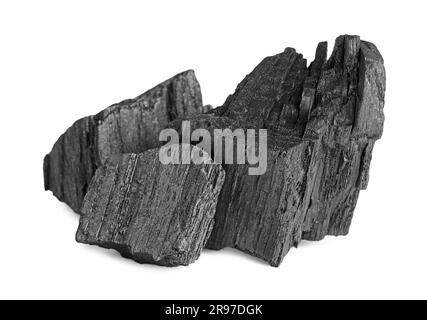 Auf weiß isolierte Kohleteile. Mineralablagerungen Stockfoto