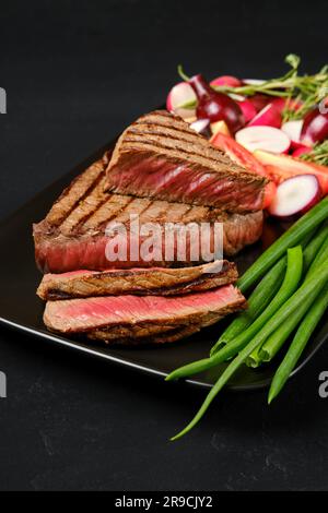 Gegrillte Steaks mit Lenden aus drei Spitzen, mittlere Reinheit Stockfoto