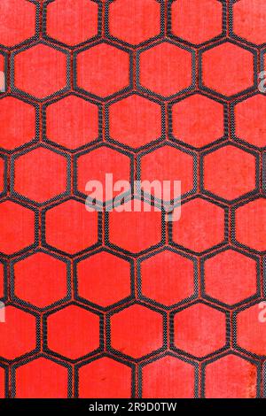 Ein Stück Samtfebric mit sechseckiger Form, luxuriöser Textilhintergrund Stockfoto