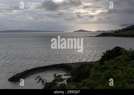 Maraetai Harbour just east of Auckland in New Zealand North Island. Maraetai is on the Tāmaki Strait, in the Hauraki Gulf. Photo: Rob Watkins Stock Photo