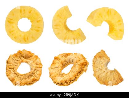 Ananasstücke auf einem weißen isolierten Hintergrund. Getrocknete und reife Ananas werden in Scheiben und Ringe geschnitten. Ananas isolieren in verschiedenen Formen. Bis Stockfoto