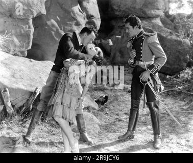 Regisseur RAOUL WALSH DOLORES DEL RIO und DON ALVARADO am Drehort Proben offen während der Dreharbeiten VON THE LOVES OF CARMEN 1927 Regisseur RAOUL WALSH Roman Prosper Merimee Fox Film Corporation Stockfoto