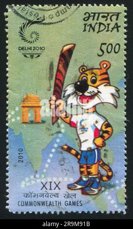 INDIEN - CIRCA 2010: Stempel gedruckt von Indien, zeigt Talisman von XIX Commonwealth Games, circa 2010 Stockfoto