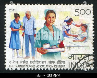 INDIEN - CIRCA 2011: Stempel gedruckt von Indien, zeigt Krankenschwestern und Patienten, circa 2011 Stockfoto