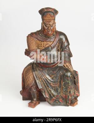 Antike, chinesisch bemalte und vergoldete Holzaltar-Figur. Stockfoto