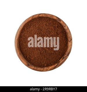 Gemahlener Kaffee in Holzschüssel isoliert auf weißem Hintergrund, Draufsicht Stockfoto