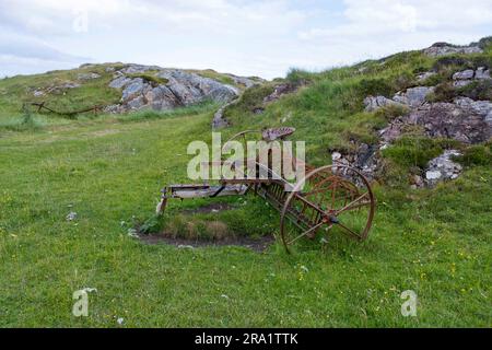 Verlassene Heumaschine ( Tumbling Tam) Bousd, Isle of Coll, Inner Hebrids, Schottland, Großbritannien. Stockfoto