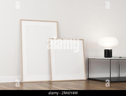 3D-Rendering von weißen Rahmen in hellen Putzwänden und Holzböden Stockfoto
