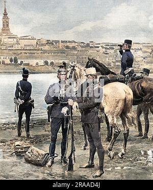 Die österreichischen Truppen warten am Ufer der Donau, auf der anderen Seite befindet sich Belgrad, die Hauptstadt Serbiens. Österreich-Ungarn erklärte Serbien am 28. Juli 1914 den Krieg, und die Truppen warteten auf den Befehl, den Fluss in serbisches Territorium zu überqueren. Datum: 1914 Stockfoto