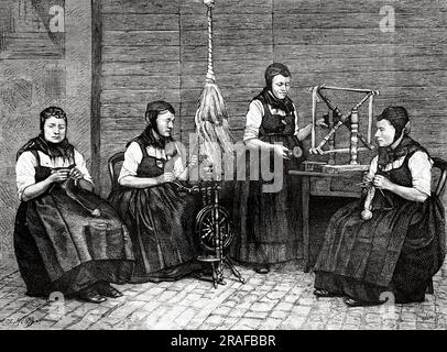 Groupe de Spinning féminin de Sondernach, Elsass, Haut-Rhin. Frankreich, Europa. Über Elsass und Lothringen bei Charles Grad 1884. Alte Gravur aus dem 19. Jahrhundert von Le Tour du Monde 1906 Stockfoto