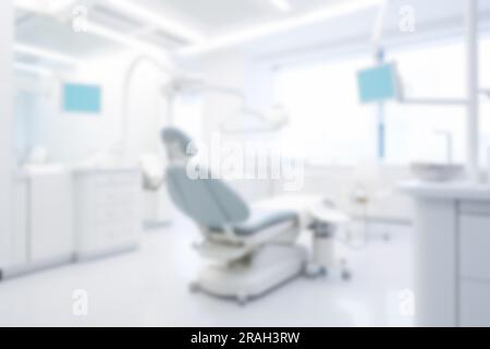 Verschwommener zahnärztlicher Klinikhintergrund. Unschärfe-Interieur moderner zahnärztlicher Praxen. Stockfoto