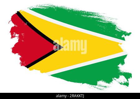 Nationalflagge von Guyana auf weißem Hintergrund mit Grunge-Strichpinsel Stockfoto