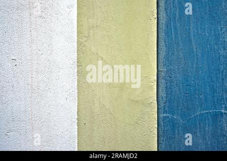 Grungy blassgelbe und blaue Farben, Wand Grafik Hintergrund Element. Stockfoto
