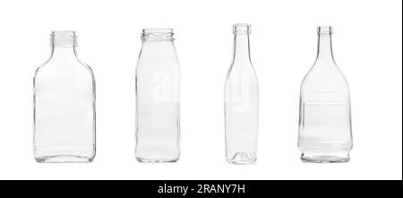 Set aus leeren transparenten Glasflaschen für alkoholische und nicht-alkoholische Getränke, isoliert auf weißem Hintergrund. Glasgeräte. Stockfoto