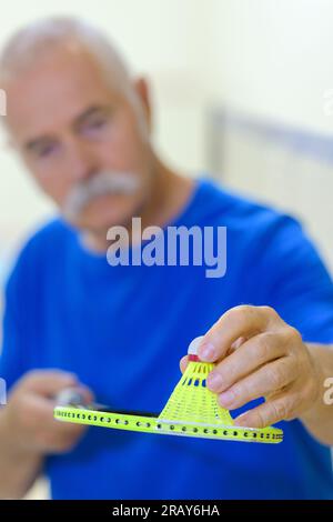 Nahaufnahme eines Senioren und Badmintons Stockfoto