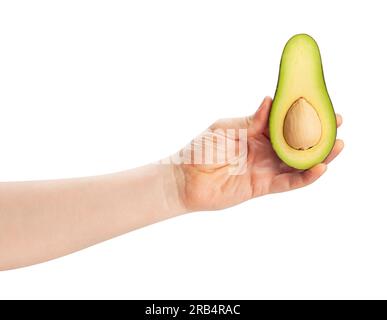 Avocado in Scheiben im Handweg isoliert auf weiß Stockfoto