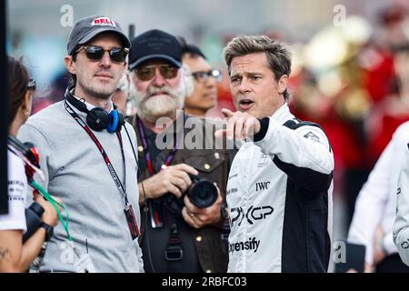 Silverstone, Großbritannien. 09. Juli 2023. KOSINSKI Josef (USA), Filmregisseur des Films F1 von Apple Studios/Bruckheimer Films, Portrait PITT Brad (USA), Schauspieler, der Sonny Hayes spielte, Fahrer des fiktiven Apex APXGP-Teams im Film F1 von Apple Studios/Bruckheimer Films, Porträt während des Formel 1 Aramco British Grand Prix 2023, 10. Runde der Formel-1-Weltmeisterschaft 2023 vom 7. Bis 9. Juli 2023 auf dem Silverstone Circuit in Silverstone, Großbritannien – Foto Xavi Bonilla/DPPI Credit: DPPI Media/Alamy Live News Stockfoto