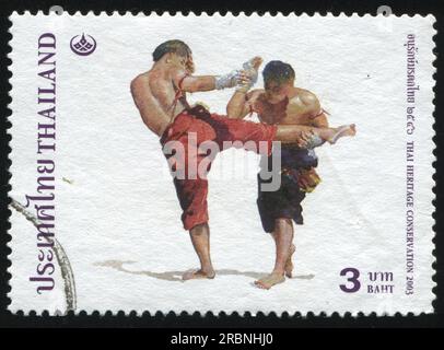 RUSSLAND KALININGRAD, 2. JUNI 2016: Thailändischer Stempel zeigt thailändisches Boxen um 2003 Stockfoto