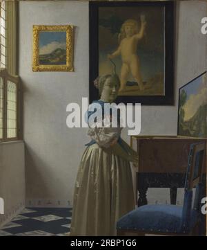 Eine Dame steht auf einer jungfräulichen 1672 von Johannes Vermeer Stockfoto