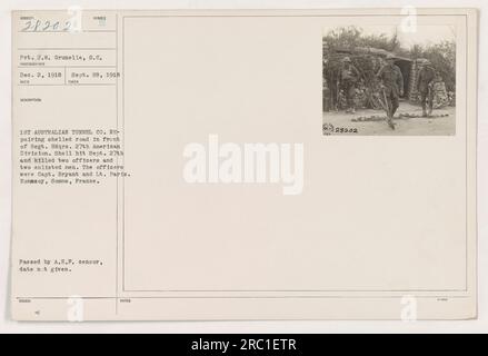 Soldaten der 1. Australian Tunnel Company reparieren eine beschattete Straße vor dem 27. Regiment Hauptquartier der amerikanischen Division in Ronas oy, Somme, Frankreich. Die Straße wurde am 27. September 1918 durch einen Granatschlag beschädigt, der zum Tod von zwei Offizieren führte, Captain Bryant und Lieutenant Paris. Das Foto wurde von Gefreiter J.W. Grunelle aufgenommen. (Hinweis: Der Rest des Titels enthält Codeinformationen und wurde ausgelassen.) Stockfoto