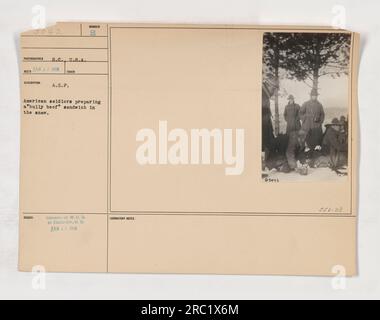 Amerikanische Soldaten im Ersten Weltkrieg bereiten am 23. Februar 1918 ein "Bully Beef" Sandwich im Schnee zu. Das Foto wurde von einem nicht identifizierten Fotografen aus den USA aufgenommen Das Bild wurde am 29. Februar 1918 vom Kriegsministerium an die Fotoabteilung herausgegeben. Stockfoto