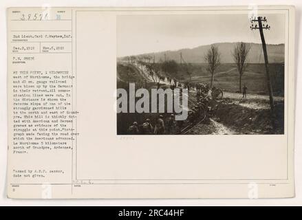 2. Lieutenant Carl C. Mayhew von der Infanterie machte dieses Foto am 6. November 1919, in der Nähe von Le Morthomme, Frankreich. Die Abbildung zeigt die Brücke und 40 cm. Die Eisenbahn wurde im Ersten Weltkrieg von den zurückziehenden Deutschen in die Luft gejagt. Die Kommunikationsleitungen wurden durchtrennt, und in der Ferne gibt es einen Hügel mit amerikanischen und deutschen Gräbern. Das Foto zeigt die Straße, auf der amerikanische Soldaten während des Konflikts vormarschierten. Stockfoto