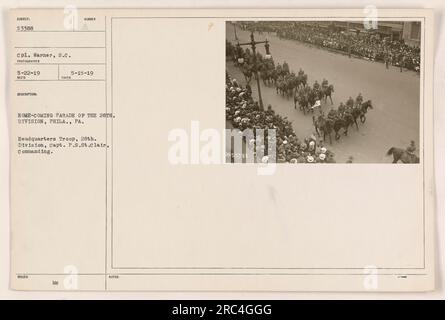 Bildunterschrift: "Homecoming Parade der 28. Division, Philadelphia, Pennsylvania." Hauptquartier-Truppe, angeführt von Captain P.S. St. Clair, Kommandant. Dieses Foto wurde am 15. Mai 1919 aufgenommen und zeigt Corporal Warner, S.C. Fotograf: 5-22-19. Stockfoto