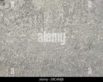 Wandhintergrund mit einer Textur aus grauem Gussbeton. Ausformung. Stockfoto