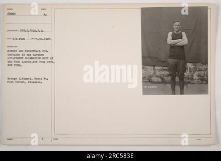 Boxer und Basketballwettkämpfer im Eastern Department treffen sich bei der 69. Armory in New York City, New York. Dieses Foto wurde am 30. März 1920 vom Fotografen Sot.K.Polk.S.C. aufgenommen Das Bild zeigt George J. Hummel, ein Schwergewicht aus Fort DuPont, Delaware, identifiziert mit der Nummer 68204 Symbol A. Stockfoto