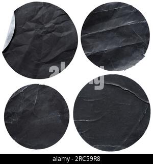 Runde schwarze Papieraufkleber auf weißem Hintergrund mit Beschneidungspfad Stockfoto