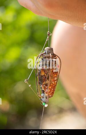 Fütterungsgerät für Fische, Angelzubehör mit fertig zubereitetem Dressing, Angelzubehör Stockfoto