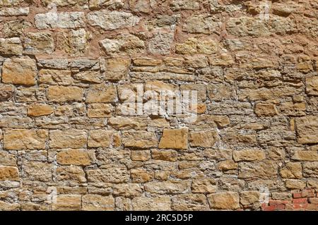 Eine alte historische Steinmauer, Rothenburg ob der Tauber, Bayern, Deutschland Stockfoto