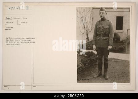 Bildunterschrift: Hauptmann R.J. Grimes, der befehlshabende Offizier der Ambulance Co #27, 3. Division, Armee der Besatzung, ist fotografiert in Anderbach, Rheinprovinz, Deutschland. Die Bildnummer ist 49848, und das Foto wurde am 10. März 1919 aufgenommen. Es ging am 20. Januar 1919 ein und erwähnte die Ausstellung von Chirurgenausrüstung. Stockfoto