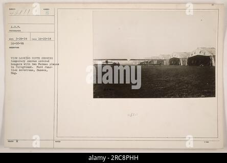 Temporäre, mit Leinwand bedeckte Hangars am Ford Junction Aerodrome in Sussex, England. Das Foto zeigt zwei Farman-Ebenen im Vordergrund. Aufgenommen am 22. Oktober 1918, von einem A.E.F-Fotografen. Die Bildunterschrift auf dem Foto lautet: 'Blick nach Süden mit temporären, mit Leinwand bedeckten Hangars mit zwei Farman-Flugzeugen im Vordergrund. Ford Junction Aerodrome, Sussex, Eng'' Stockfoto